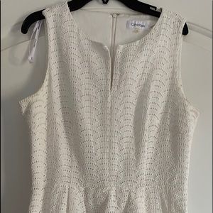 White sleeveless eyelet dress